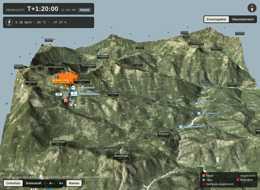 3D-Lagebild: Einsatzgebiet im Gebirge mit Brandfläche, Einsatzleitung, Bereitstellungsraum und Hubschrauber